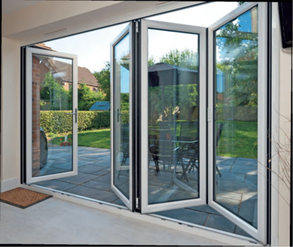 White bifold doors installation in Liverpool extension